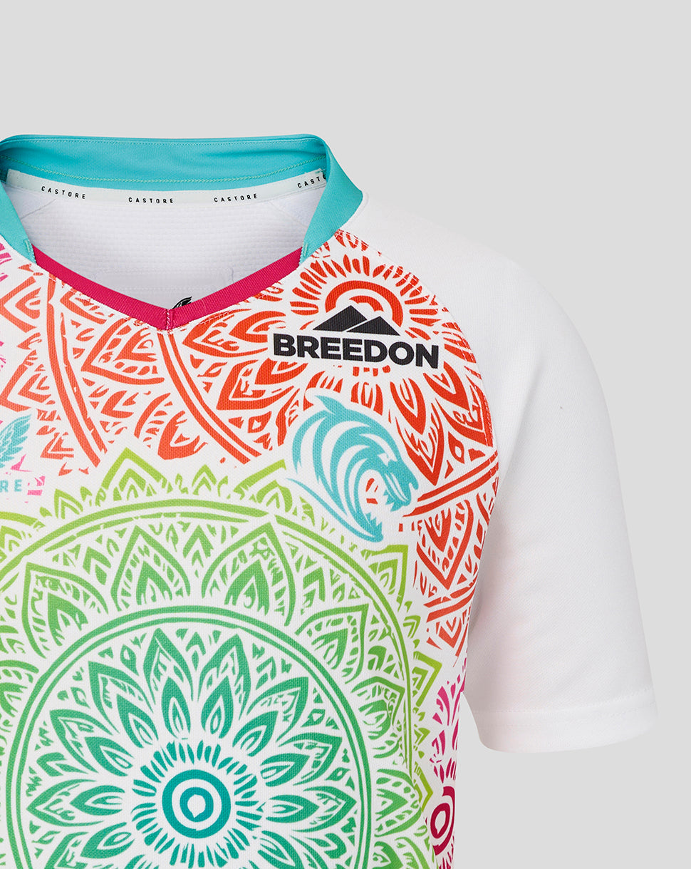 Colorful patterned shirt with 'Breedon' logo on a white background