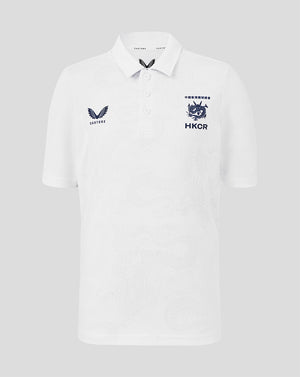 White polo shirt with embroidered logos on a light gray background
