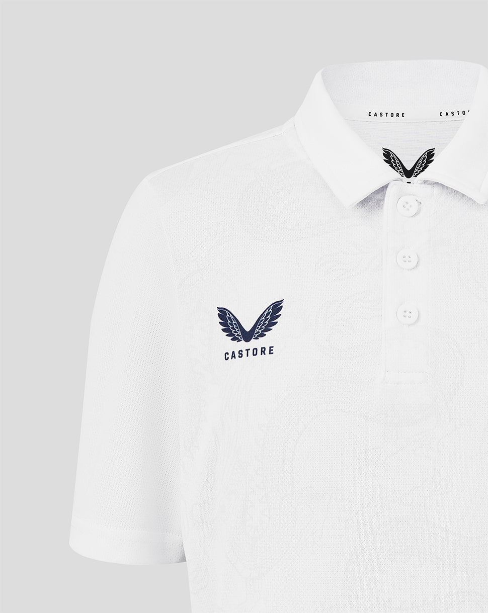 White polo shirt with Castore logo on a light gray background