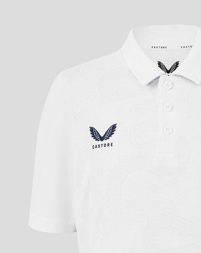 White polo shirt with Castore logo on a light gray background