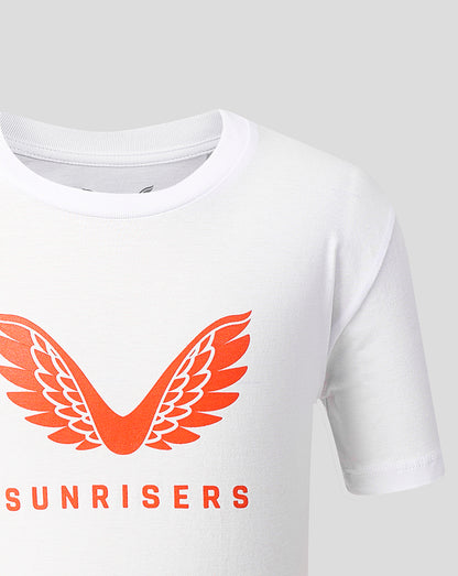 Front view of white juniors T shirt with bold orange wings logo and SUNRISERS text