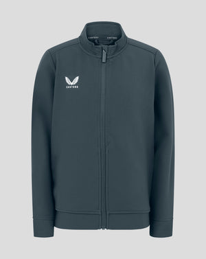 Front view of Junior Track Jacket in dark slate with funnel neck, full zip and Castore logo on chest.