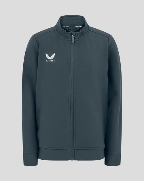 Front view of Junior Track Jacket in dark slate with funnel neck, full zip and Castore logo on chest.