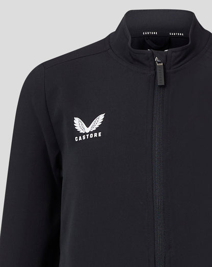 Close-up of black Junior Track Jacket showing funnel neck and front zipper with Castore branding on the collar.