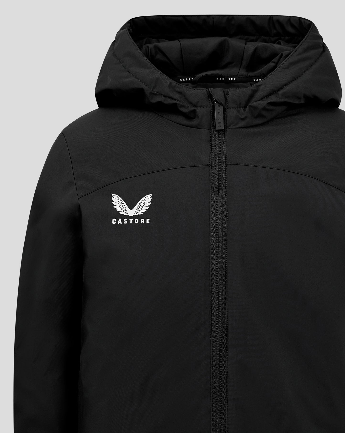 Close-up of hood and zipper on black bench jacket with CASTORE branding and chest logo.