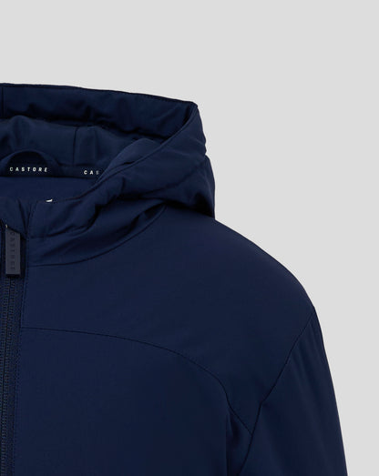 Detail of navy hooded jacket with interior Castore branding and a visible vertical zipper pull.
