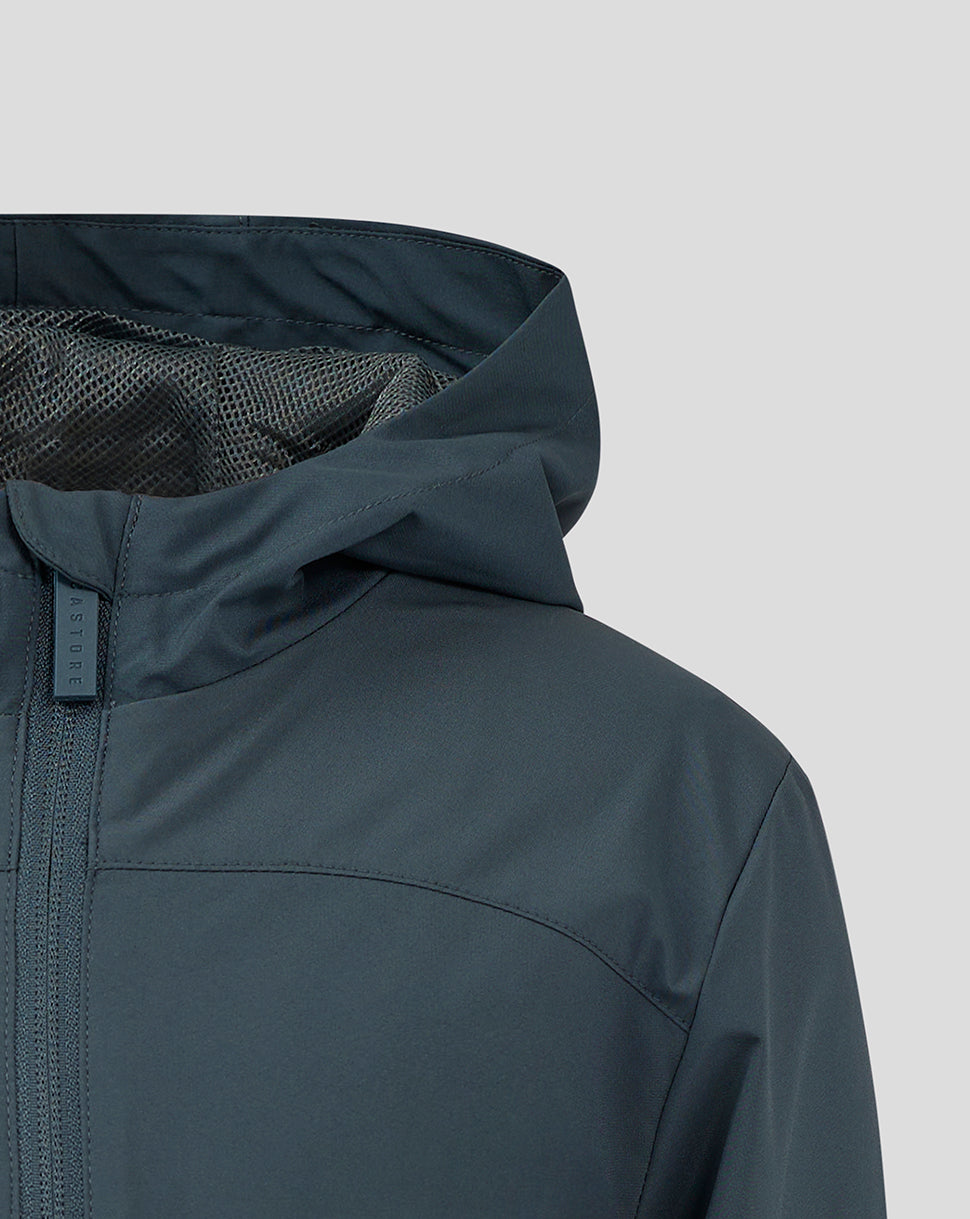 Close up of a dark slate hooded junior rain jacket showing the hood and front zipper with mesh lining visible at the collar