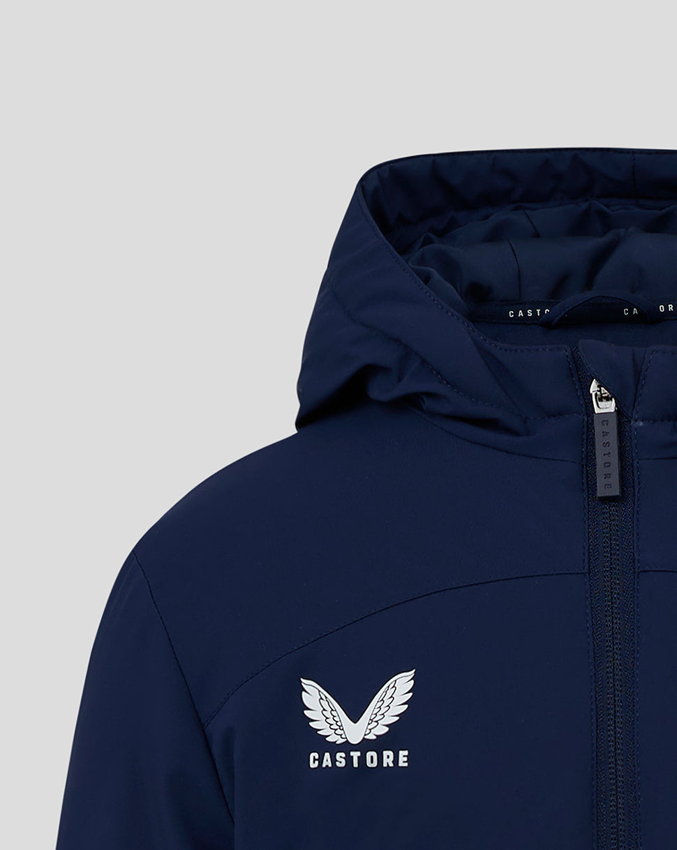 Junior Long Bench Jacket in dark navy with hood, front zip and Castore logo on chest