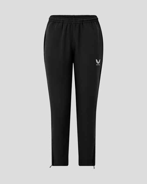 Front view of black Junior Track Pant with drawcord waist and Castore logo at the hip