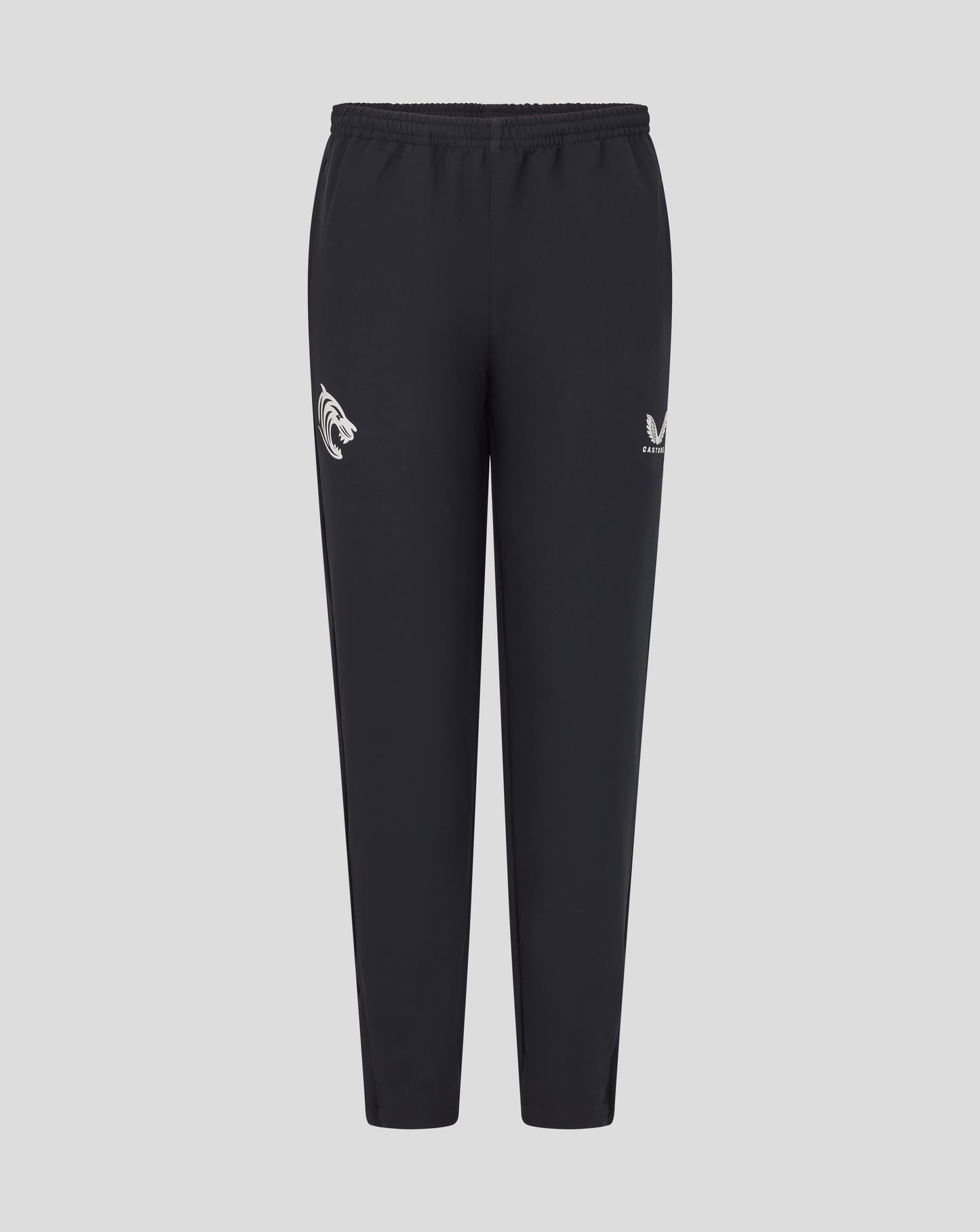 Front view of junior Leicester Tigers training track pants in dark navy with a tiger head on the left leg and a laurel emblem on the right.