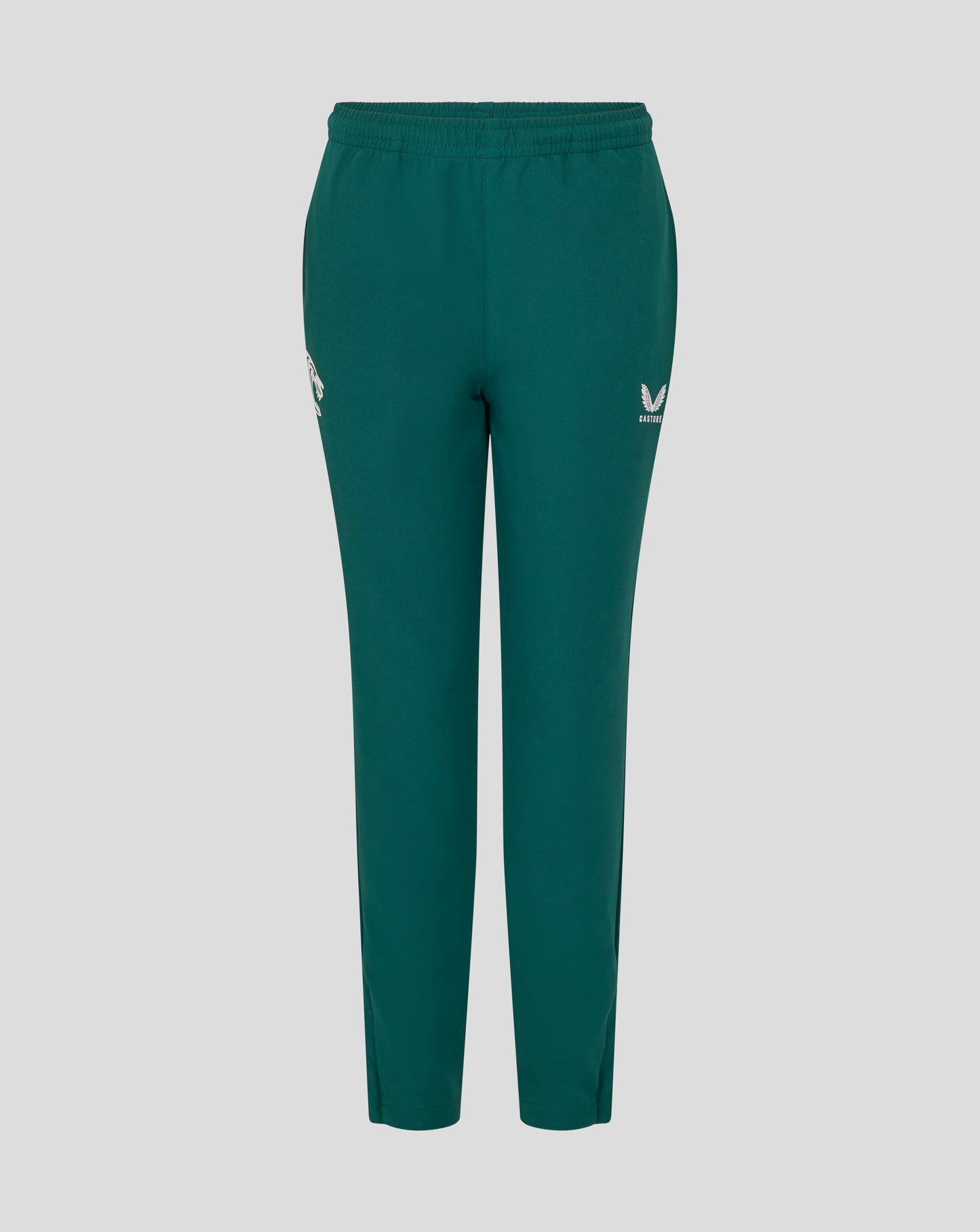 Botanical green junior training track pants shown from the back with elastic waistband.