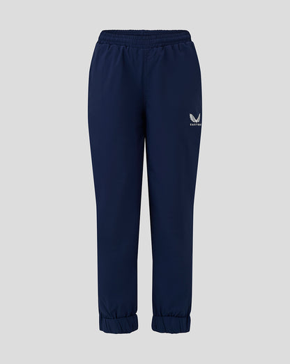 Junior navy rugby pants with elastic cuffs and Castore logo on the thigh
