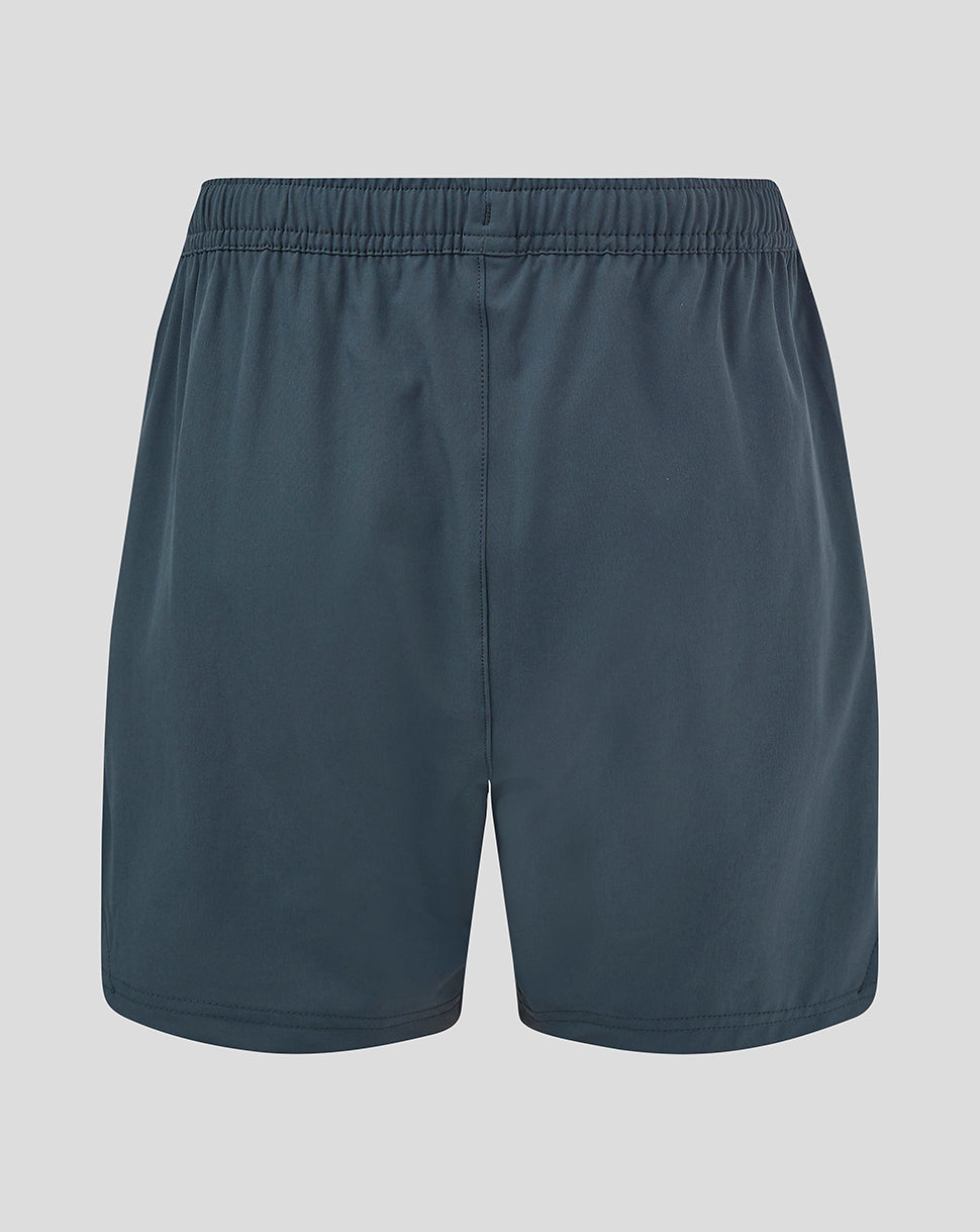 Back view of dark slate woven training shorts with elastic waistband and central rear seam.