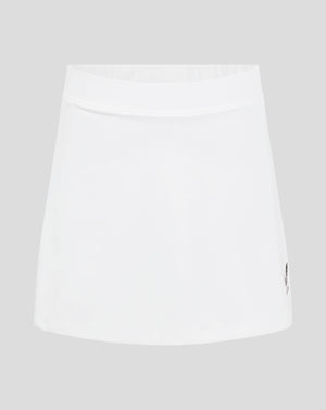 Close up of white junior skort waistband with elasticated band