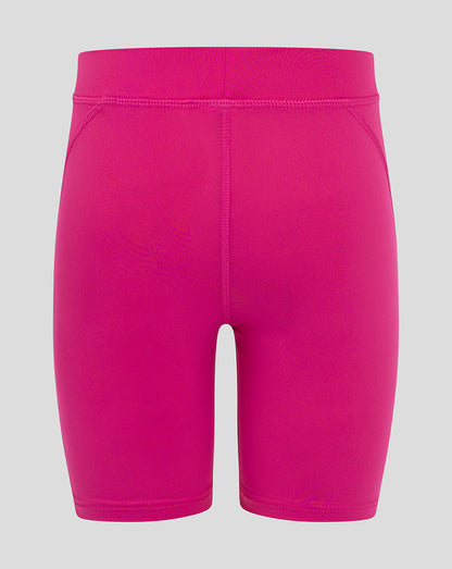 Back view of bright pink Junior Baselayer Short with central seam and flatlock finish