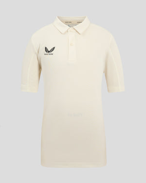 Cannoli Cream junior cricket playing shirt with polo collar and three button placket featuring Castore wing logo on left chest