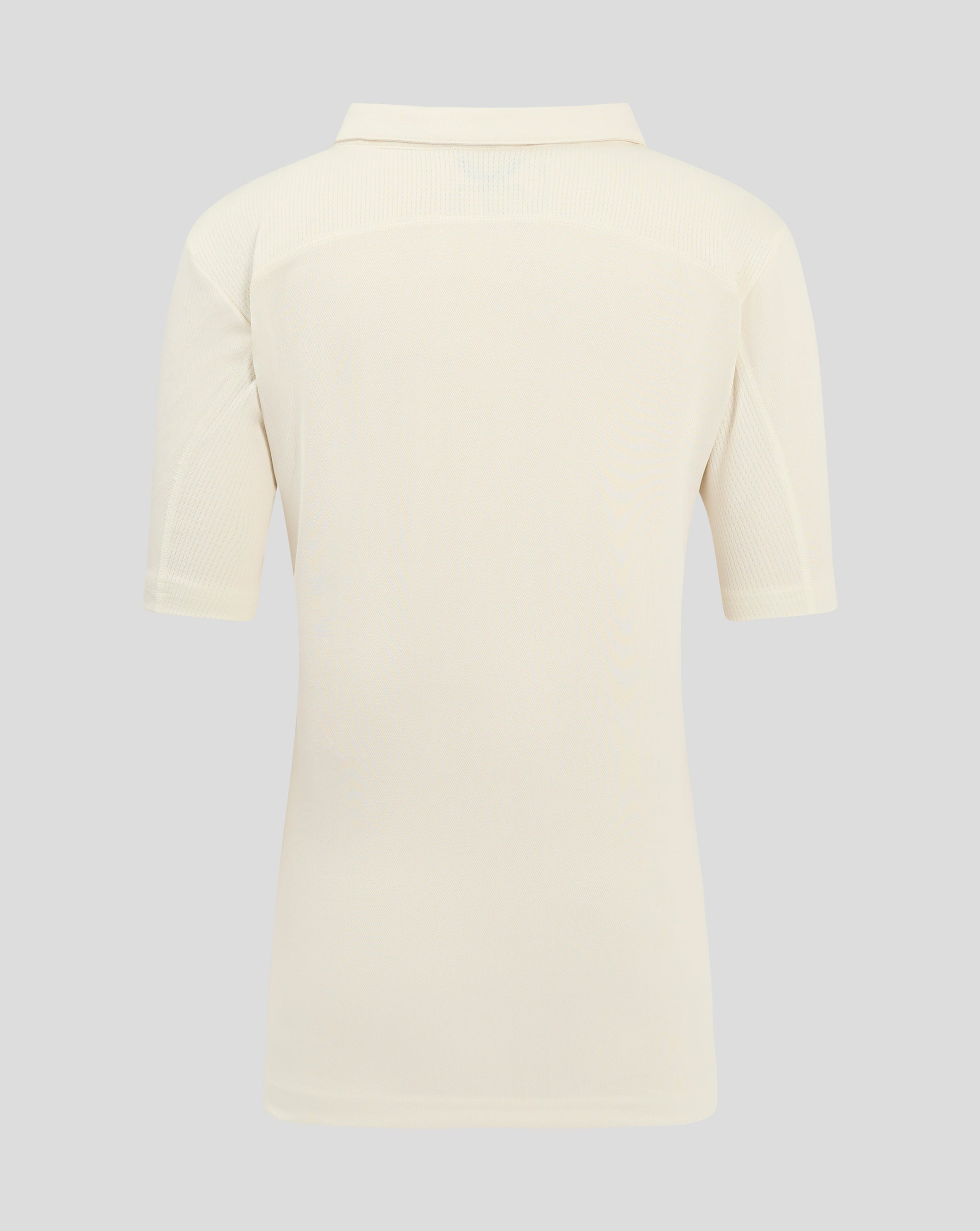 Back view of Cannoli Cream junior cricket shirt with self fabric collar and shoulder paneling