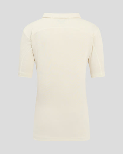 Back view of Cannoli Cream junior cricket shirt with self fabric collar and shoulder paneling