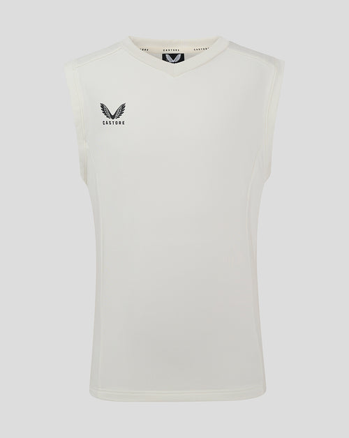 Front view of Cannoli Cream junior cricket vest, sleeveless cream top with Castore logo on the left chest.