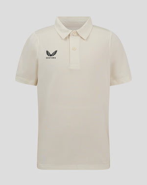 Junior Cannoli Cream cricket playing shirt with three button placket and forward shoulder seam