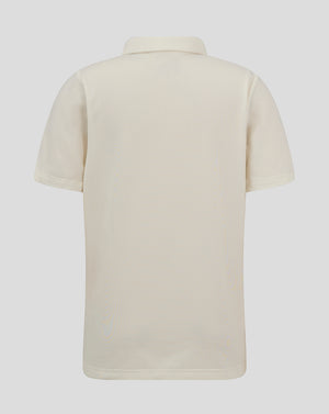 Back view of Cannoli Cream Junior Cricket Tech Playing Shirt showing perforated fabric and curved hem.