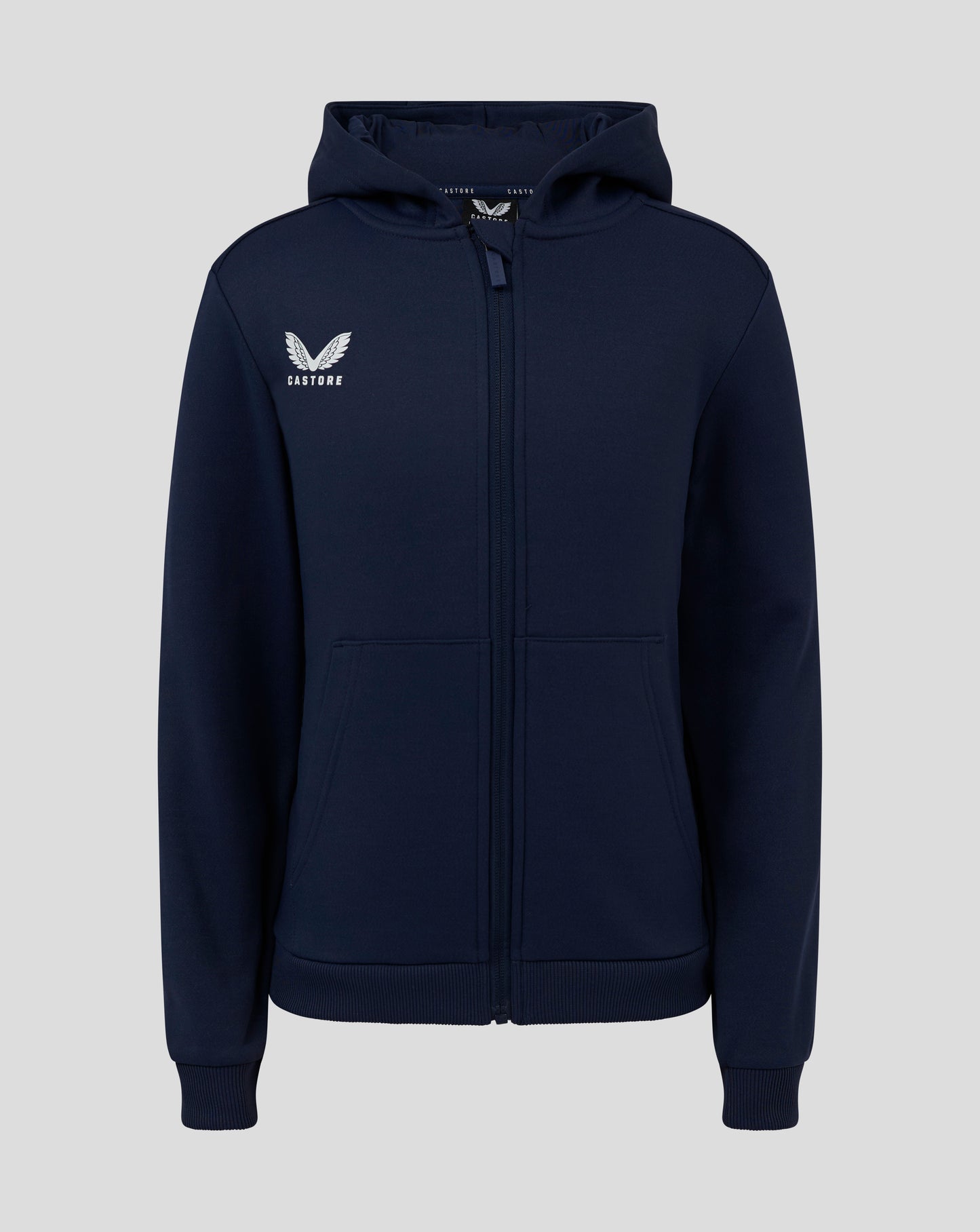 Front view of Junior Full Zip Brushback Hoodie in Peacoat with Castore logo on left chest, zip closure and kangaroo pockets