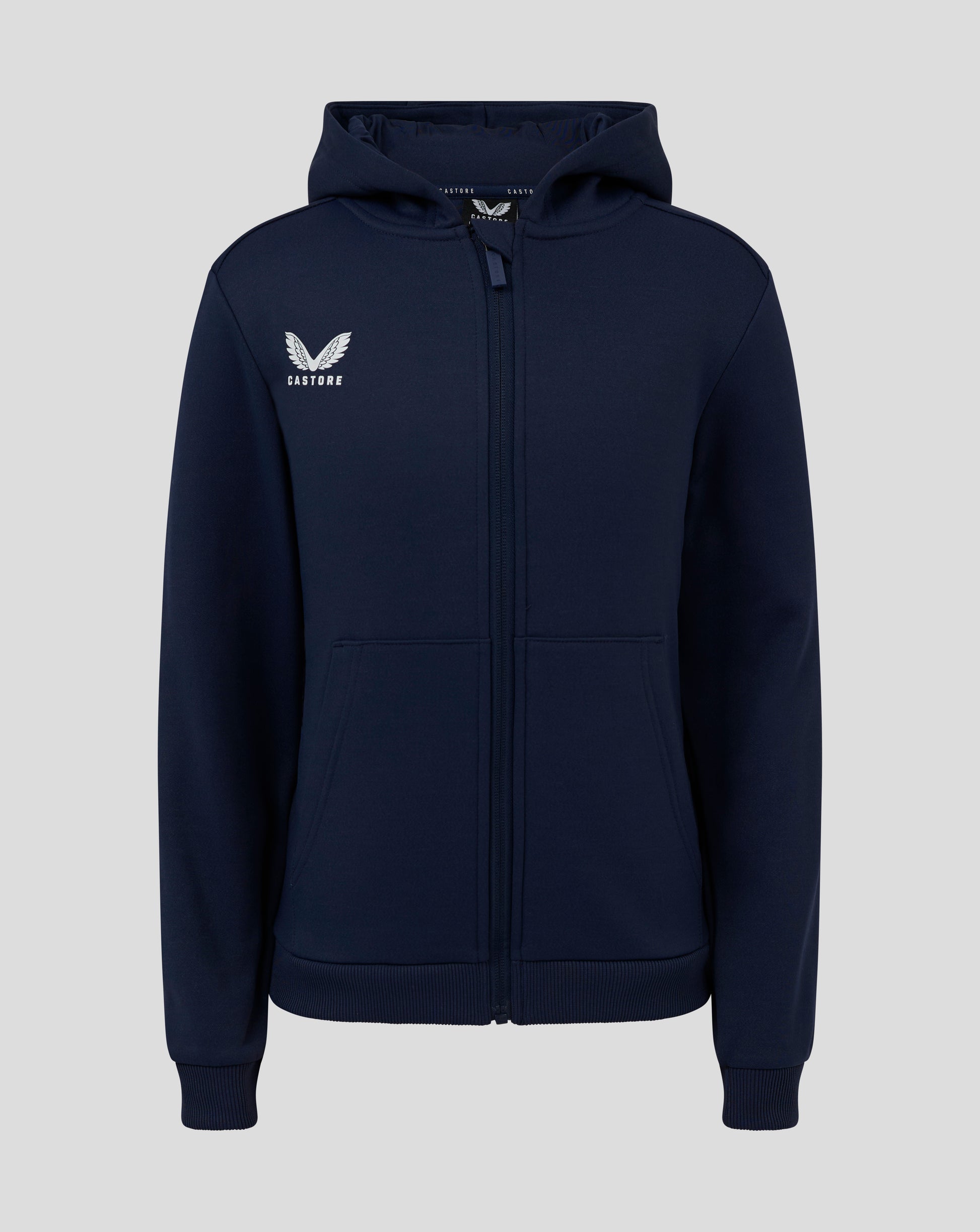 Front view of Junior Full Zip Brushback Hoodie in Peacoat with Castore logo on left chest, zip closure and kangaroo pockets