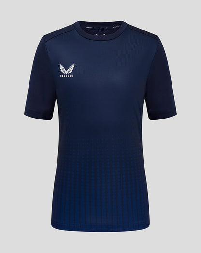 Gradient navy training tee with a dotted pattern at the bottom and white Castore logo on the chest.