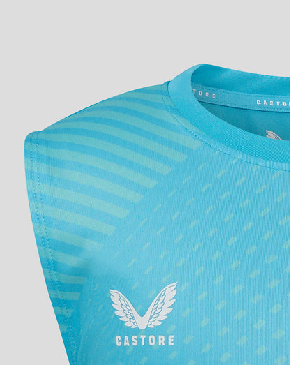 Close-up of aqua blue geometric printed training tee with diagonal pattern and Castore wing logo on the chest