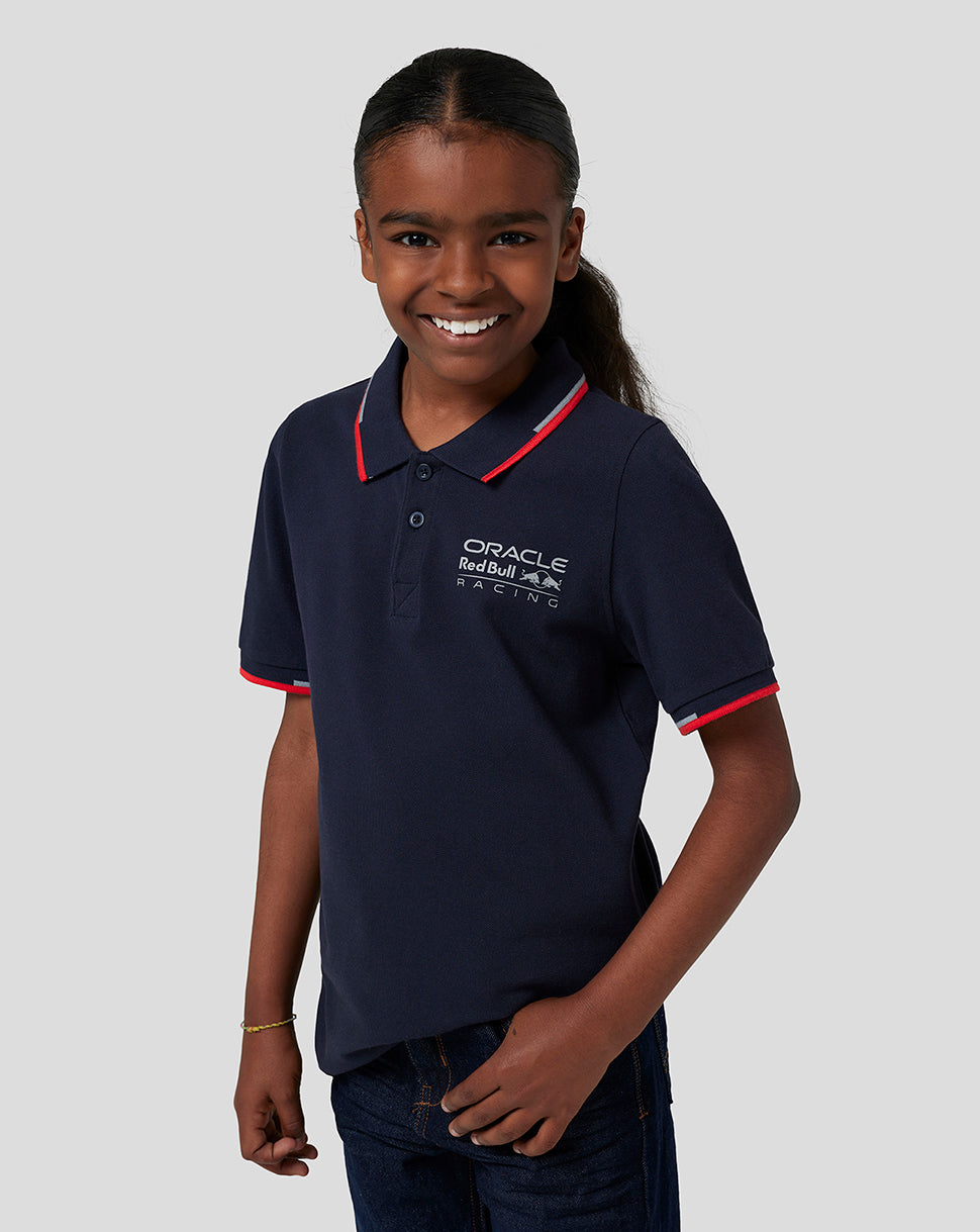 Junior polo in Night Sky navy with red piping and Oracle Red Bull Racing logo on chest