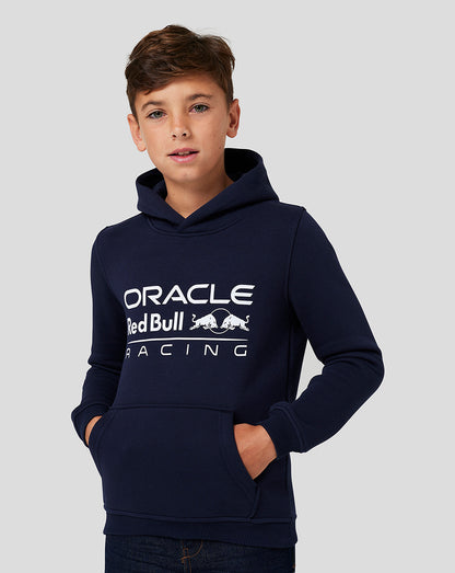 Young boy in a Night Sky Oracle Red Bull Racing hoodie with large logo