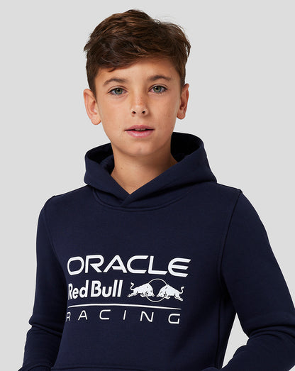 Boy wearing Night Sky Core Overhead Hoodie with Oracle Red Bull Racing logo
