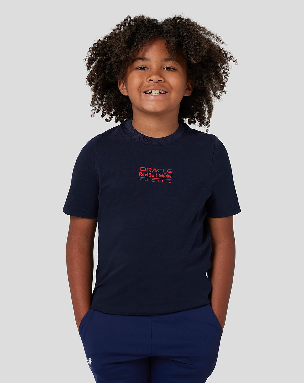 Smiling child in navy Night Sky T-shirt featuring the Oracle Red Bull Racing logo on the chest