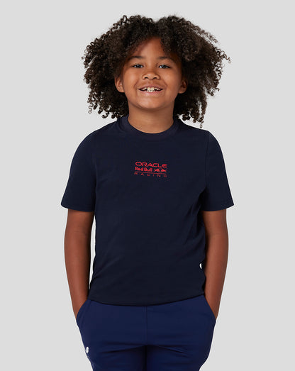 Smiling child in navy Night Sky T-shirt featuring the Oracle Red Bull Racing logo on the chest
