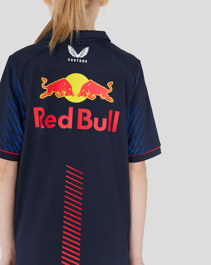 Back view of navy Oracle Red Bull Racing polo with large Red Bull logo on the back and a red diagonal stripe down the back