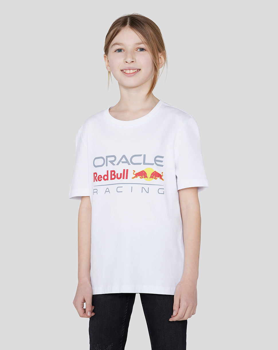 Girl in white Oracle Red Bull Racing T shirt with large front logo