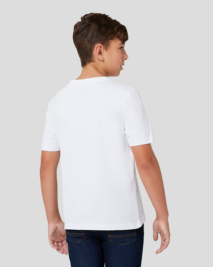 Boy in white Oracle Red Bull Racing T shirt seen from the back