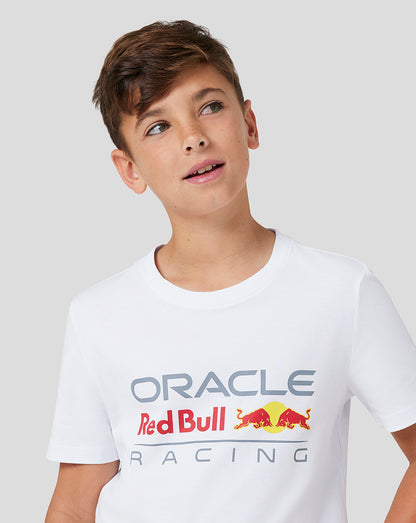 Child in white Oracle Red Bull Racing junior large front logo T shirt with full color logo