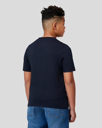 Back view of a young boy wearing a navy Oracle Red Bull Racing t shirt.