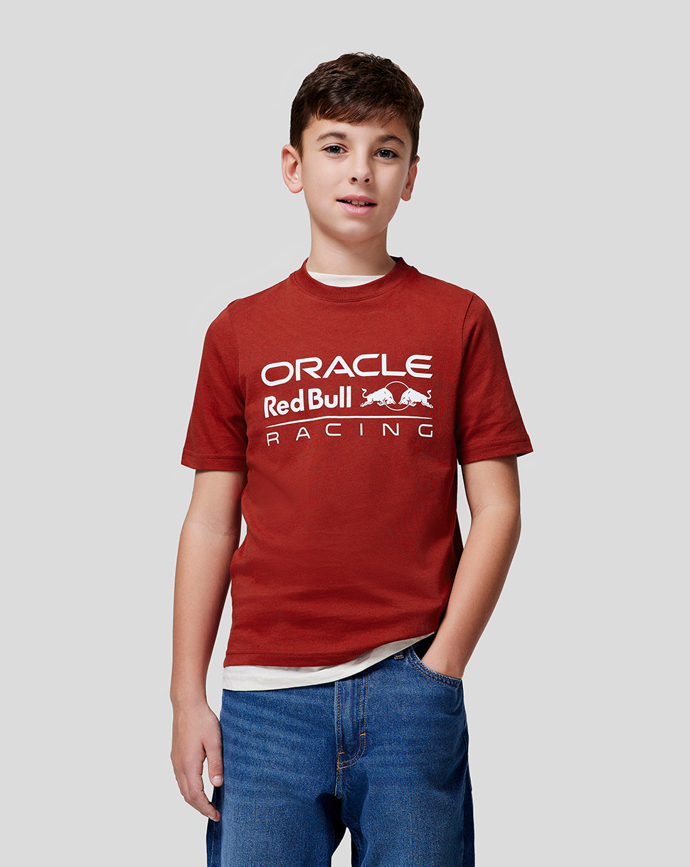 Junior boy wearing red Oracle Red Bull Racing tee with large white logo on the chest