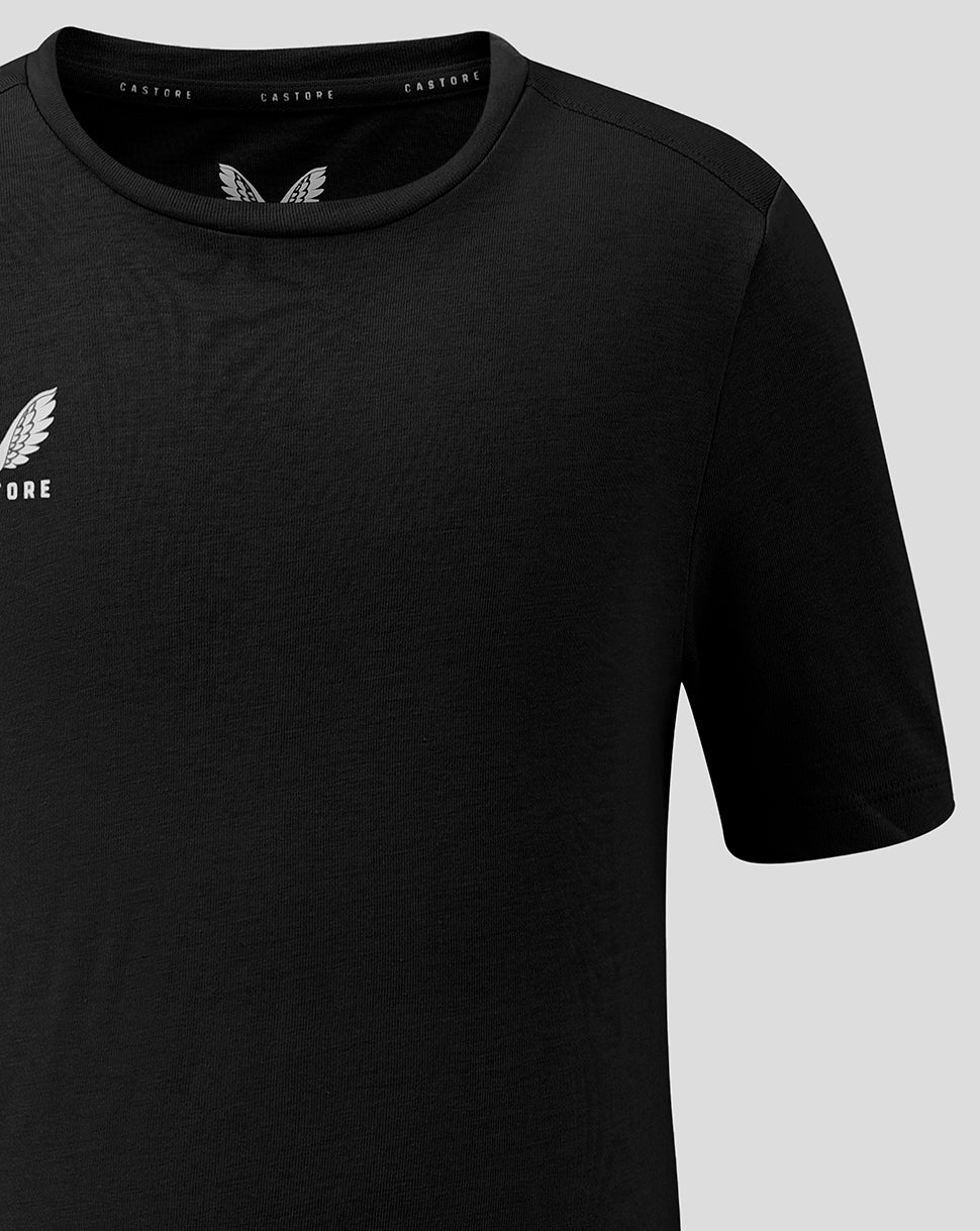 Front view of black Junior Cotton Leisure Tee showing white Castore wing logo on left chest and branded neckline