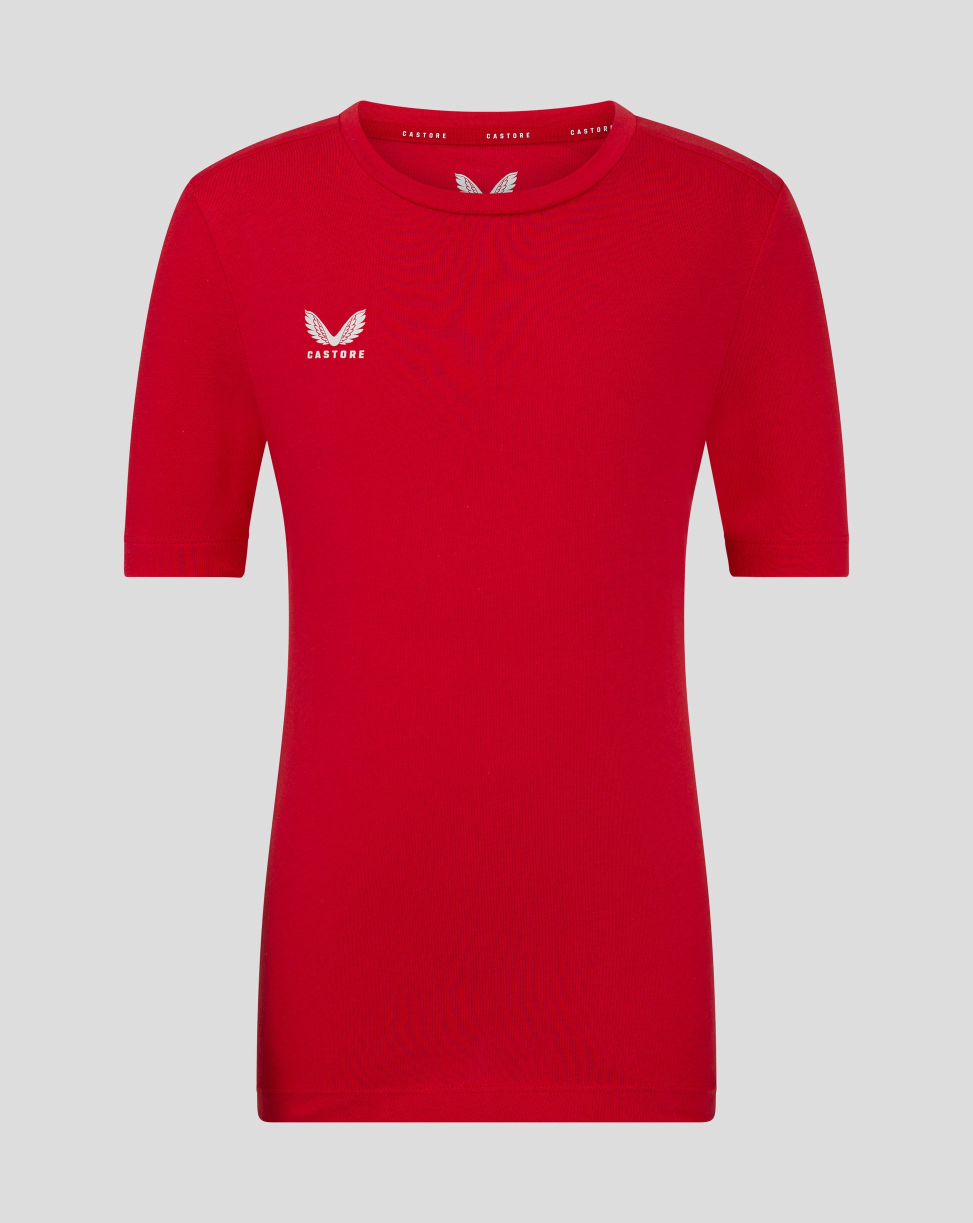 Front view of red Junior Cotton Leisure Tee with a white Castore logo on the left chest and crew neck.