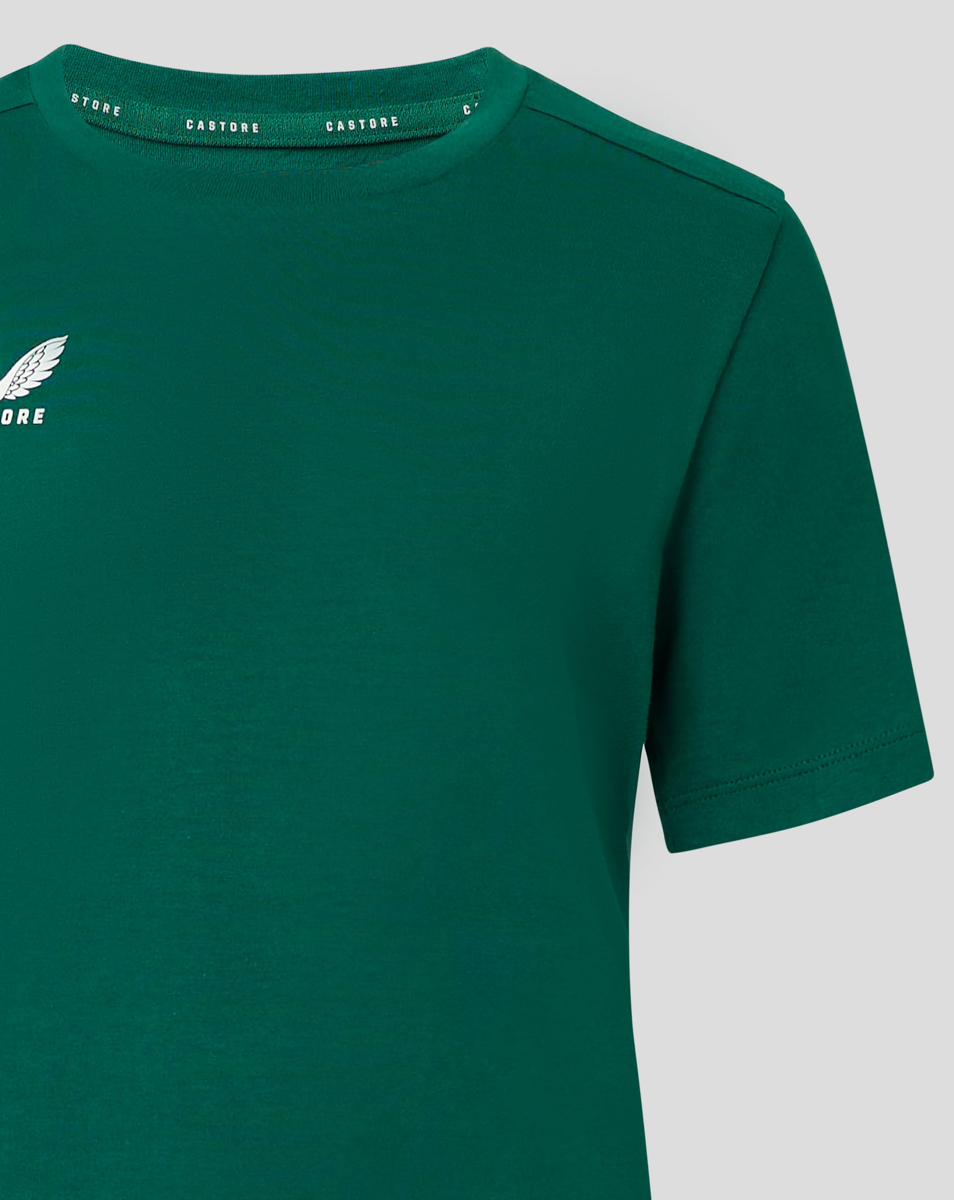 Front view of green junior cotton leisure tee with white Castore wing logo on the left chest