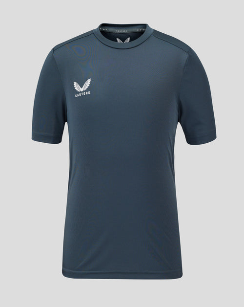 Front view of junior performance tee in dark slate with crew neck and Castore logo