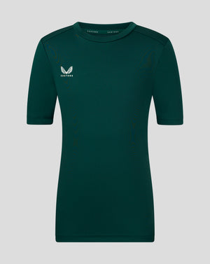 Junior performance tee in deep botanical green with white wing Castore logo on the left chest.
