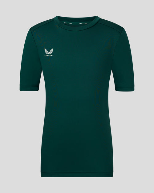 Junior performance tee in deep botanical green with white wing Castore logo on the left chest.