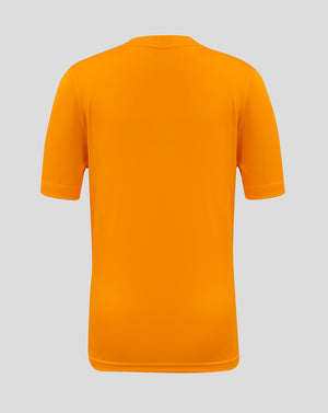 Back view of bright marigold junior performance tee with plain logo free back
