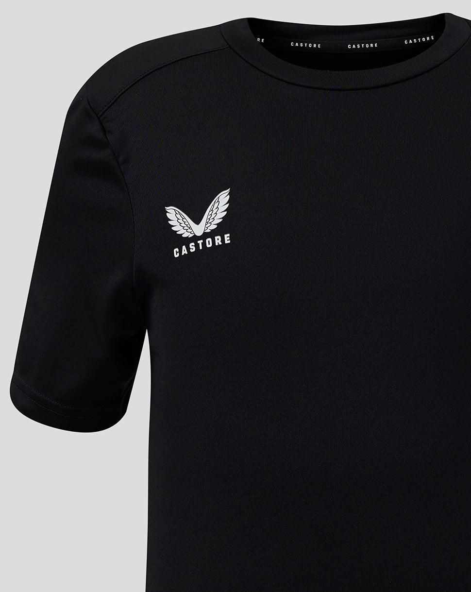 Close-up of black Junior Performance Tee with white Castore logo on left chest