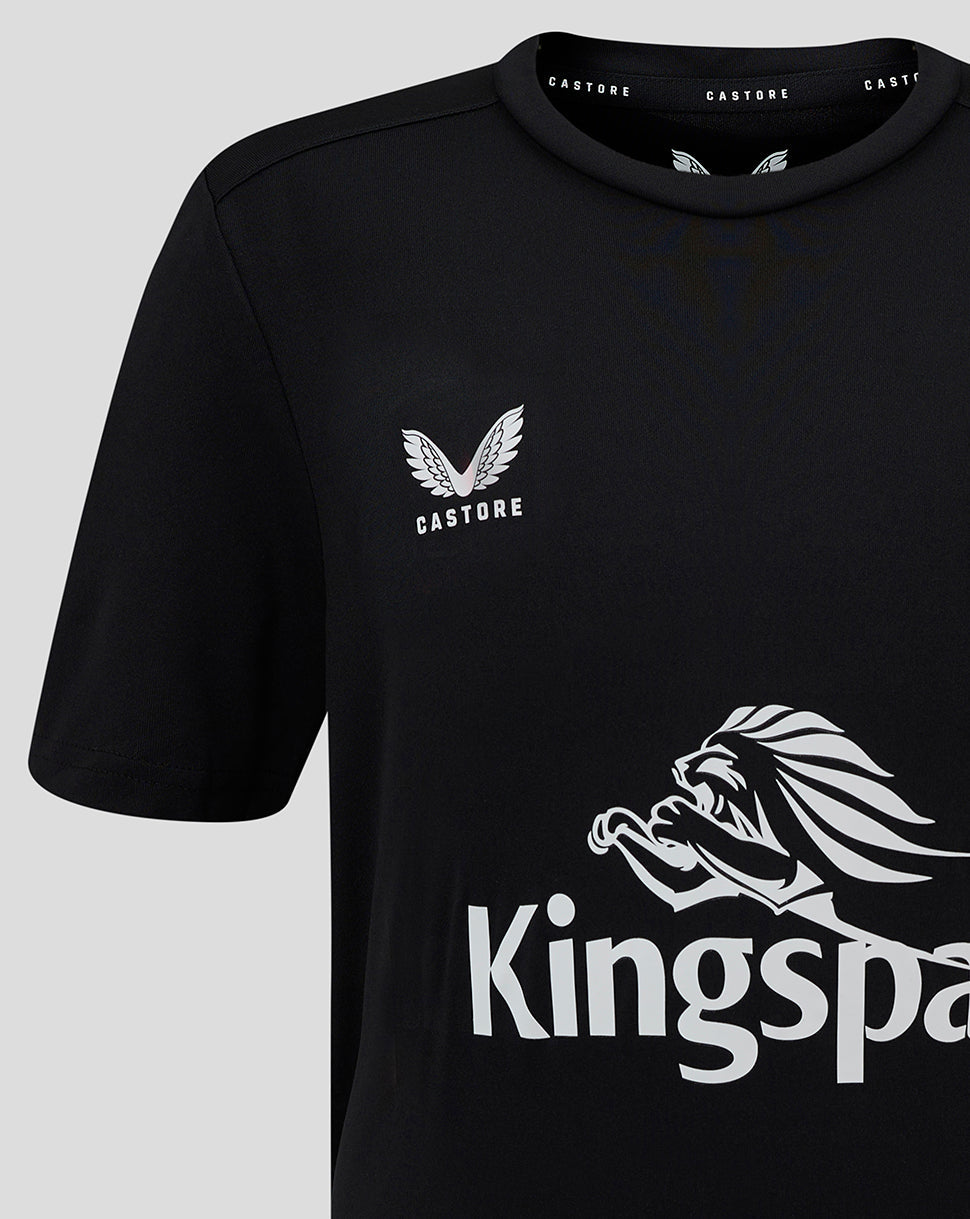 Close-up of black tee showing a small Castore logo on the left chest and a large Kingspan graphic across the front.