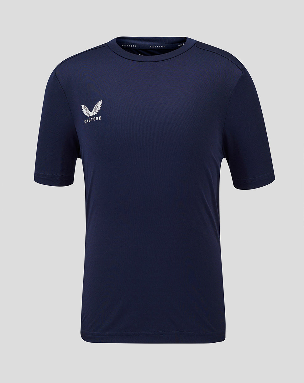 Front view of navy Junior Performance Tee with white Castore logo on the left chest.